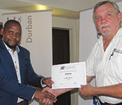 Lucky Ntuli, MUT, winner of the Student Award Scheme for the 2nd Semester seen accepting his award from chairman Hennie Prinsloo. For more information about Lucky’s project please go to: <a href="https://instrumentation.co.za/papers/J4343.pdf" target="_blank">https://instrumentation.co.za/papers/J4343.pdf</a>